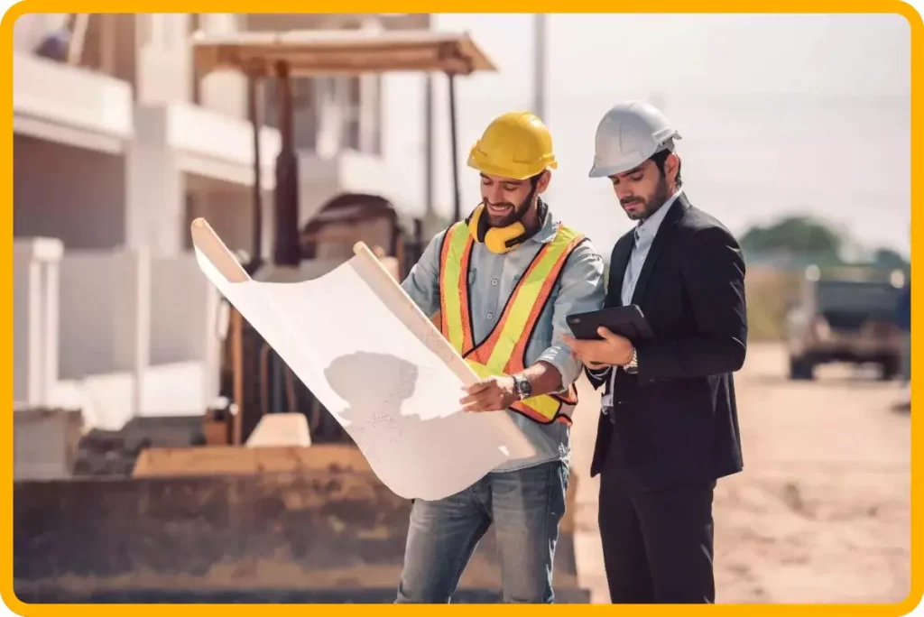 two people working at construction site